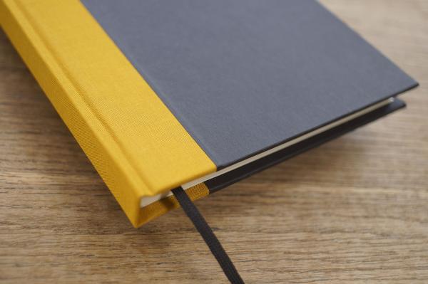 Writing and notebook black, with curry linen
